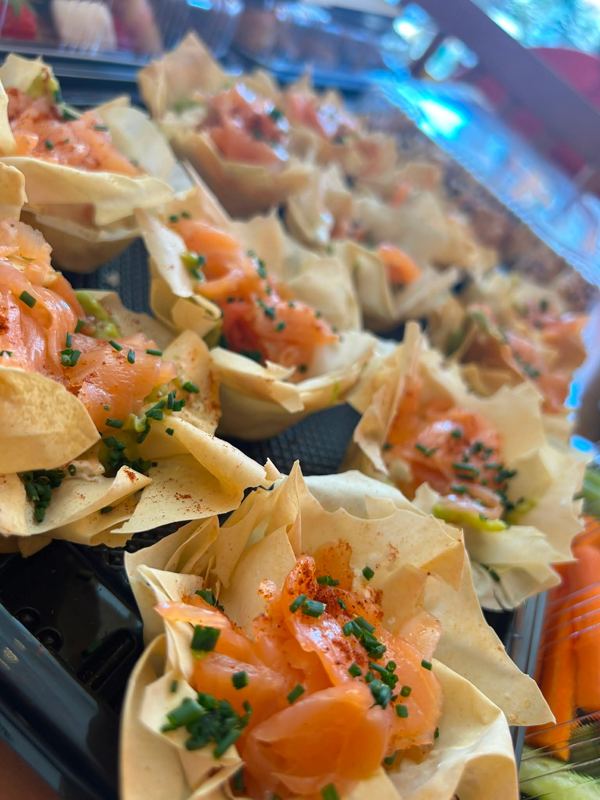 Crisp filo cups filled with smoked salmon, avocado and chives